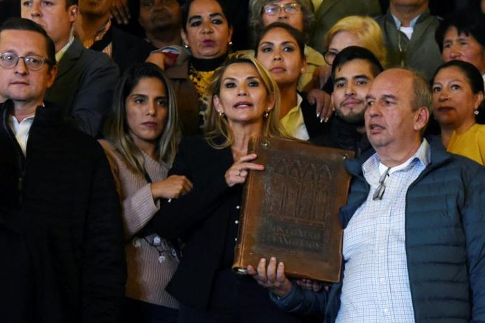 Anez brandished a copy of the Gospels as she arrived at the presidential palace