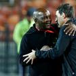 Mamelodi Sundowns coach Pitso Mosimane (L) greets Al Ahly counterpart Rene Weiler in Egypt last month after a CAF Champions League quarter-final