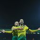 Staying alive: Mario Vrancic (right) scored the opening goal as bottom-of-the-table Norwich held Tottenham