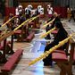 Palm fronds adorned largely empty pews as Pope Francis celebrated Palm Sunday mass in St. Peter's Basilica mass on April 5. Easter services are set to take place behind closed doors