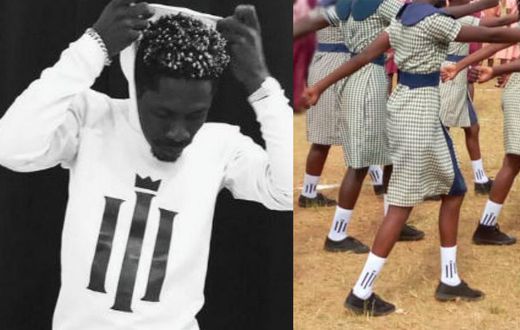 Shatta Wale reacts to student marching in reign socks