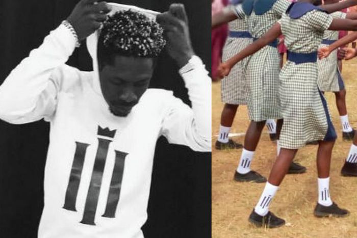 Shatta Wale reacts to student marching in reign socks
