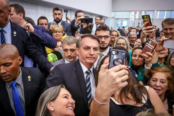 Brazilian President Jair Bolsonaro greets Miami's Brazilian community after an event at Miami Dade College's Medical Campus in Miami, Florida, on March 9, 2020