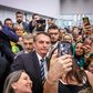 Brazilian President Jair Bolsonaro greets Miami's Brazilian community after an event at Miami Dade College's Medical Campus in Miami, Florida, on March 9, 2020