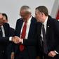 Mexican President Andres Manuel Lopez Obrador (L) shakes hands with US Trade Representative Robert Lighthizer as Mexico's Jesus Seade looks on at the trade pact signing on December 10, 2019 in Mexico City; labor monitoring later became an issue