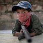 Children in Ayahualtempa train with rifles or makeshift guns to join the fight against drug cartels