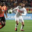 Midfielders Kwame Bonsu (L) of Esperance and Ferjani Sassi of Zamalek contest possession during a CAF Champions League quarter-final second leg in Tunis