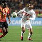 Midfielders Kwame Bonsu (L) of Esperance and Ferjani Sassi of Zamalek contest possession during a CAF Champions League quarter-final second leg in Tunis