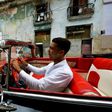 Yosbel Sosa drives tourists around Havana in a 1959 Chevy