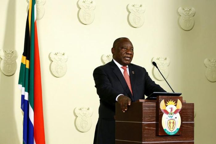 South African President Cyril Ramaphosa addresses the nation on the COVID-19 epidemic in Pretoria on March 15, 2020; Ramaphosa said the country would close its borders to all foreign nationals from countries highly impacted by the virus