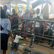 Little girl stranded at BRT station, sits ignorantly beside her mother’s dead body (photos)