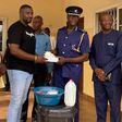 John Dumelo donates items to Ayawaso West police officer to fight coronavirus