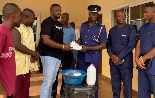 John Dumelo donates items to Ayawaso West police officer to fight coronavirus
