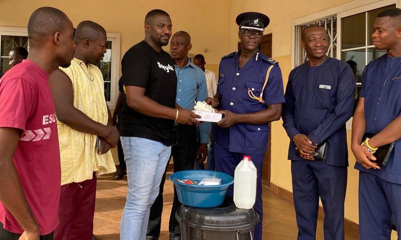 John Dumelo donates items to Ayawaso West police officer to fight coronavirus