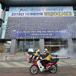 South Korean health officials spray disinfectant in front of the Daegu branch of the Shincheonji Church of Jesus in an attempt to combat the COVID-19 coronavirus outbreak