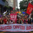 Women marching in Sao Paulo, Brazil on March 8, 2020 -- International Women's Day -- carried a banner saying "Women Against Bolsonaro"