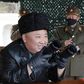 North Korean leader Kim Jong Un did not don a facemask to supervise the firing of what state media called a 'long-range artillery' drill