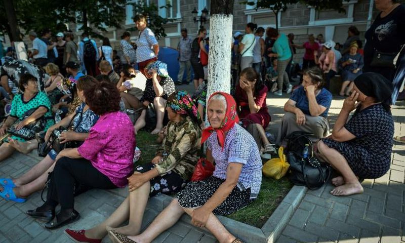 Supporters of the Democratic Party of Moldova, led by oligarch Vladimir Plahotniuc, protest in front of the interior ministry in Moldova's capital Chisinau, in June 2019, during a political crisis