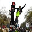Protesters take part in a demonstration against the pension overhauls, on Place de la Nation in Paris, on December 5, 2019