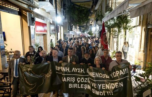 Cypriot demonstrators from both sides of the divided island marched in Nicosia to call for progress in reunifications talks