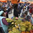 Shoppers crowd a market in La Paz after Bolivian interim President Jeanine Anez announced the country was going to be placed under a complete quarantine to stop the spread of the novel coronavirus