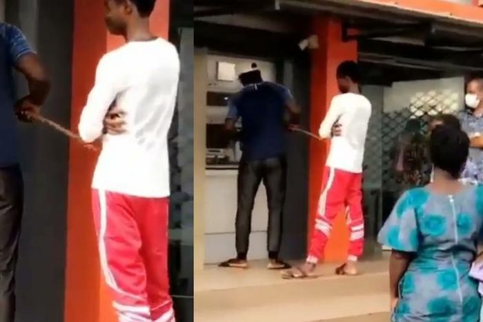 Man uses stick to withdraw money from ATM to avoid contracting COVID-19 (video)