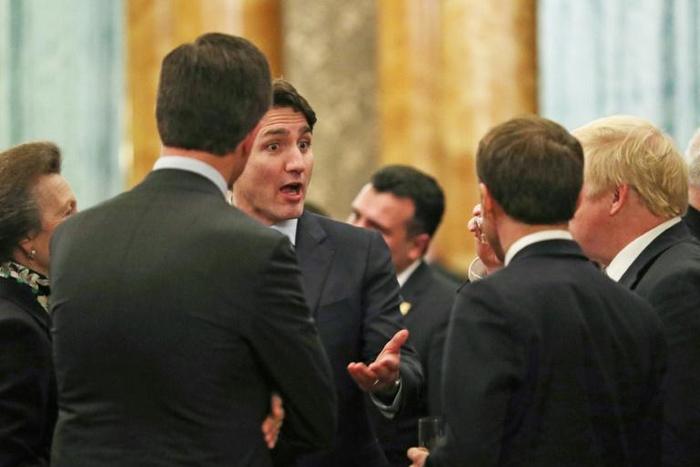 Canadian Prime Minister Justin Trudeau, (3rdL) speaks with and Britain's Prime Minister Boris Johnson (R), France's President Emmanuel Macron (2ndR), NATO Secretary General Jens Stoltenberg (2ndL) and Britain's Princess Anne at Buckingham Palace