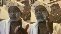 Shatta Wale applying soap