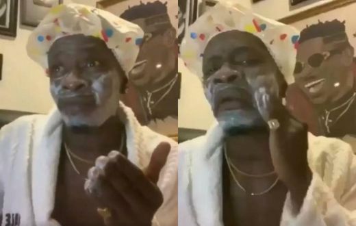 Shatta Wale applying soap