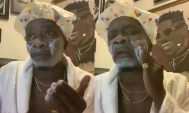 Shatta Wale applying soap