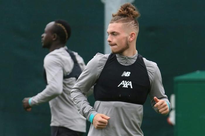 Liverpool midfielder Harvey Elliott takes part in a training session