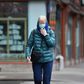A New Yorker wears a face mask on the street