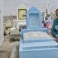 Maria Guadalupe Guereca beside the tomb of her son Sergio Hernandez who was killed in a cross-border shooting by a US border patrol agent