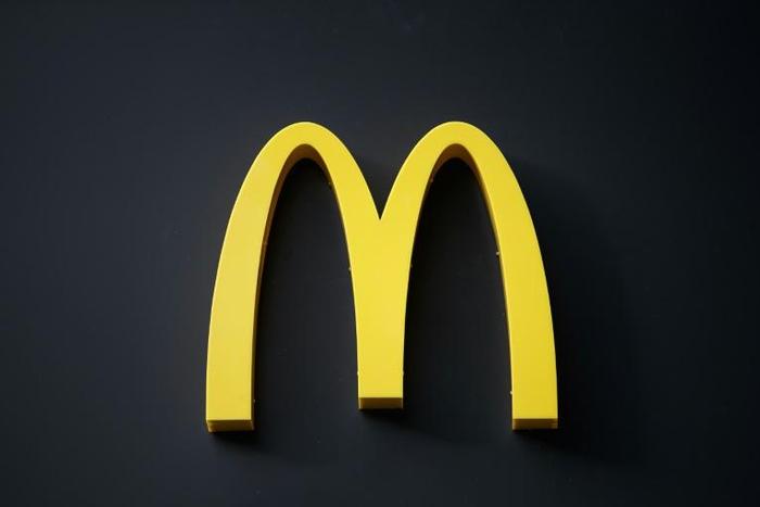 A Peruvian franchise operator has been fined after two workers died while cleaning the kitchen at a McDonald's