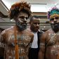 Papuan activists Ambrosius Mulait (left) and Dano Anes Tabuni speak to journalists during their trial in Jakarta