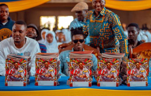 Strongman donates books to AMASS SHS and promises to donate 5,000 books to other schools