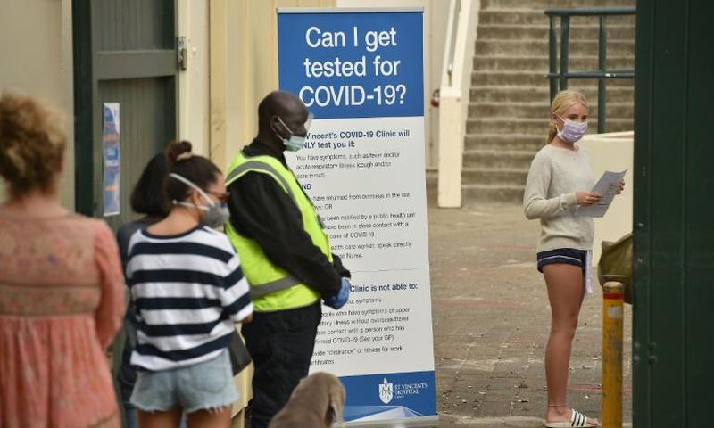 People line up for coronavirus testing at Bondi Beach in Sydney