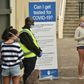 People line up for coronavirus testing at Bondi Beach in Sydney