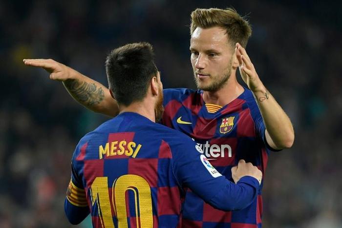 Barcelona's Croatian midfielder Ivan Rakitic (right) has sustained an Achilles injury.