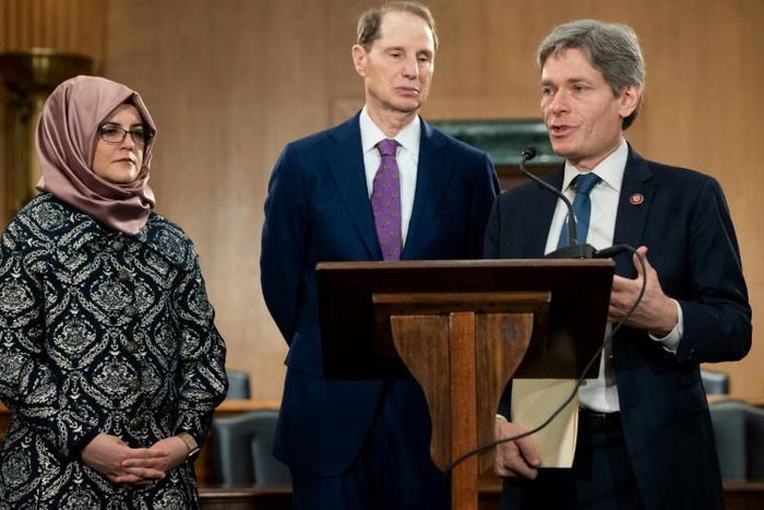 Hatice Cengiz, slain Washington Post columnist Jamal Khashoggi's fiancee, stands alongside Senator Ron Wyden and Representative Tom Malinowski during a press conference calling for the Trump administration to release details about his killing