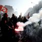 Protesters joined a demonstration in Versailles, where French President Emmanuel Macron was hosting an investment summit