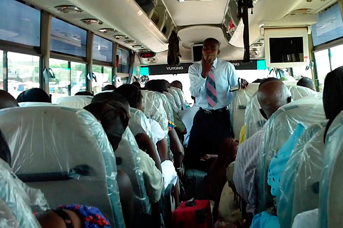 Pastor preaching in trotro