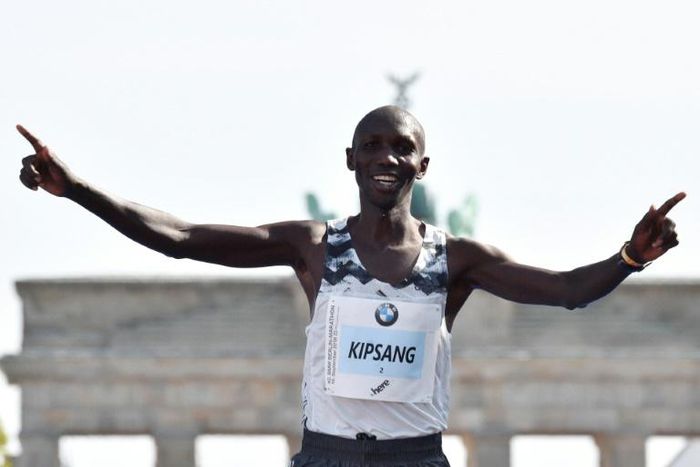 Kipsang, seen here at the Berlin Marathon in 2018, spent the night in jail for breaking Kenya's curfew