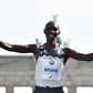 Kipsang, seen here at the Berlin Marathon in 2018, spent the night in jail for breaking Kenya's curfew