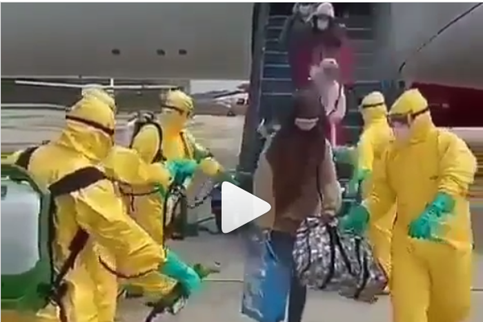 Video shows passengers being sprayed at the airport to avoid Coronavirus