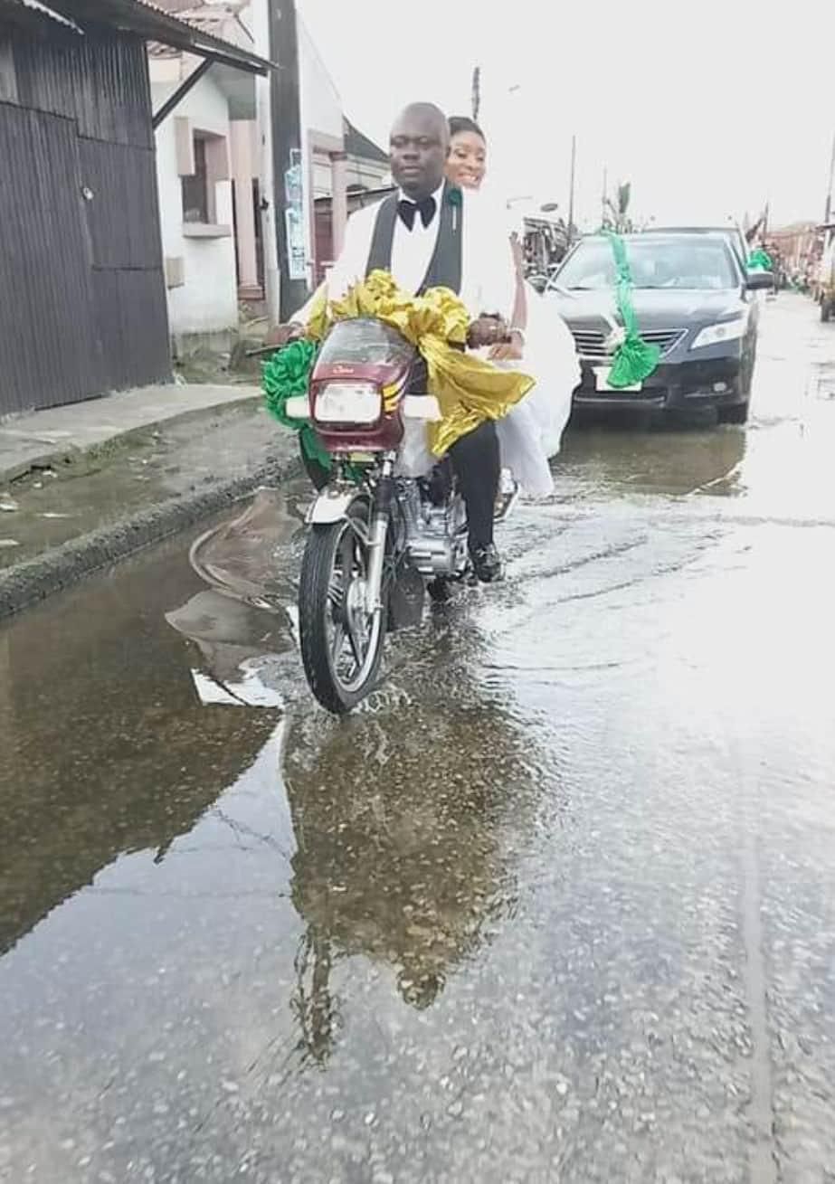 Frugal couple rides a motorbike to their marital home after wedding