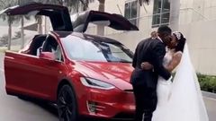 Tesla at Kennedy Osei and Tracy's white wedding