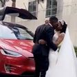 Tesla at Kennedy Osei and Tracy's white wedding
