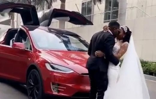 Tesla at Kennedy Osei and Tracy's white wedding
