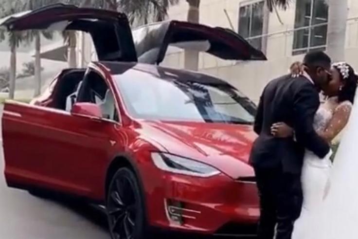 Tesla at Kennedy Osei and Tracy's white wedding